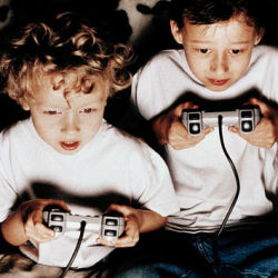 youngsters with videogame controllers