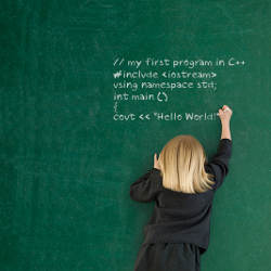 child at blackboard