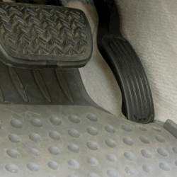 unsecured driver-side floor mat