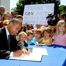 Massachusetts Governor Deval Patrick signing legislation