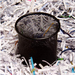 trash can and shredded paper