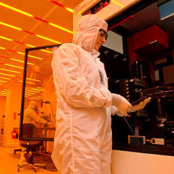 researchers in nanofabrication facility
