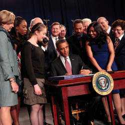 President Obama signing the America Invents Act