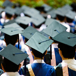 students in graduate caps and gowns