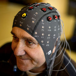 patient wearing cap with electrodes