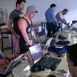 Young men at a Miami-based hackathon for Cuba.