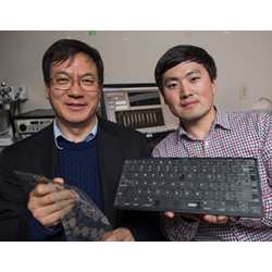 Georgia Institute of Technology professor Zhong Lin Wang (left) and graduate research assistant Jun Chen.