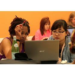 A mentor and apprentice at a CoderGirl event. CoderGirl, created by LaunchCode, offers free weekly meetings meant to bring women with an interest in computer programming together with female mentors who can guide them.