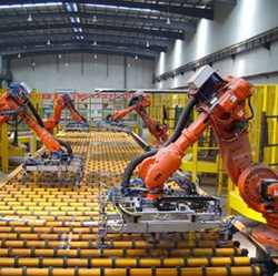 Industrial robots on an assembly line.