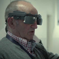 A patient in Paris wears Pixium's Bionic Vision Restoration System.
