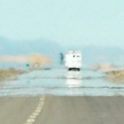 vehicle on desert roadway
