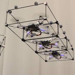 ModQuad drones that dock in mid-air.