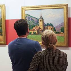 Visitors admire a painting in France's Étienne Terrus Museum, where more than half of the paintings were found to be fakes.