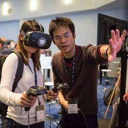 A trade show attendee gets the lowdown on a potential employer via virtual reality.
