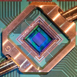 D-Wave’s superconducting quantum computer chip.