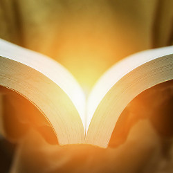 light emanating from an open book, illustration