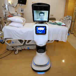Mercy Telehealth Network medical director Dr. Alan Shatzel using the telepresence RP-VITA robot at Mercy San Juan Hospital in Carmichael, CA.