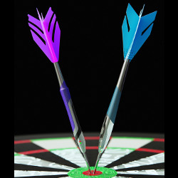 two darts in dartboard bullseye