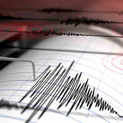 A seismograph captures the shaking of an earthquake as lines on a chart.