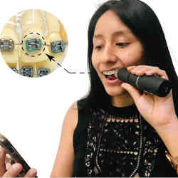 A young woman using the BraceIO system.