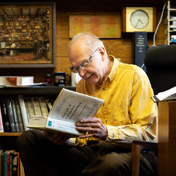 Donald Knuth reading 'The Art of Computer Programming'