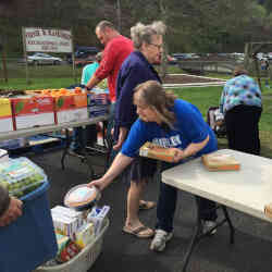 Volunteers distribute free food at the mobile pantry in Hurley, VA.