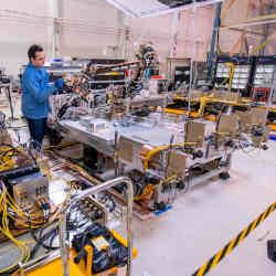 U.S. Naval Research Laboratory robotics engineer John Kinch prepares Robotic Arm System #2 for kinematic calibration.