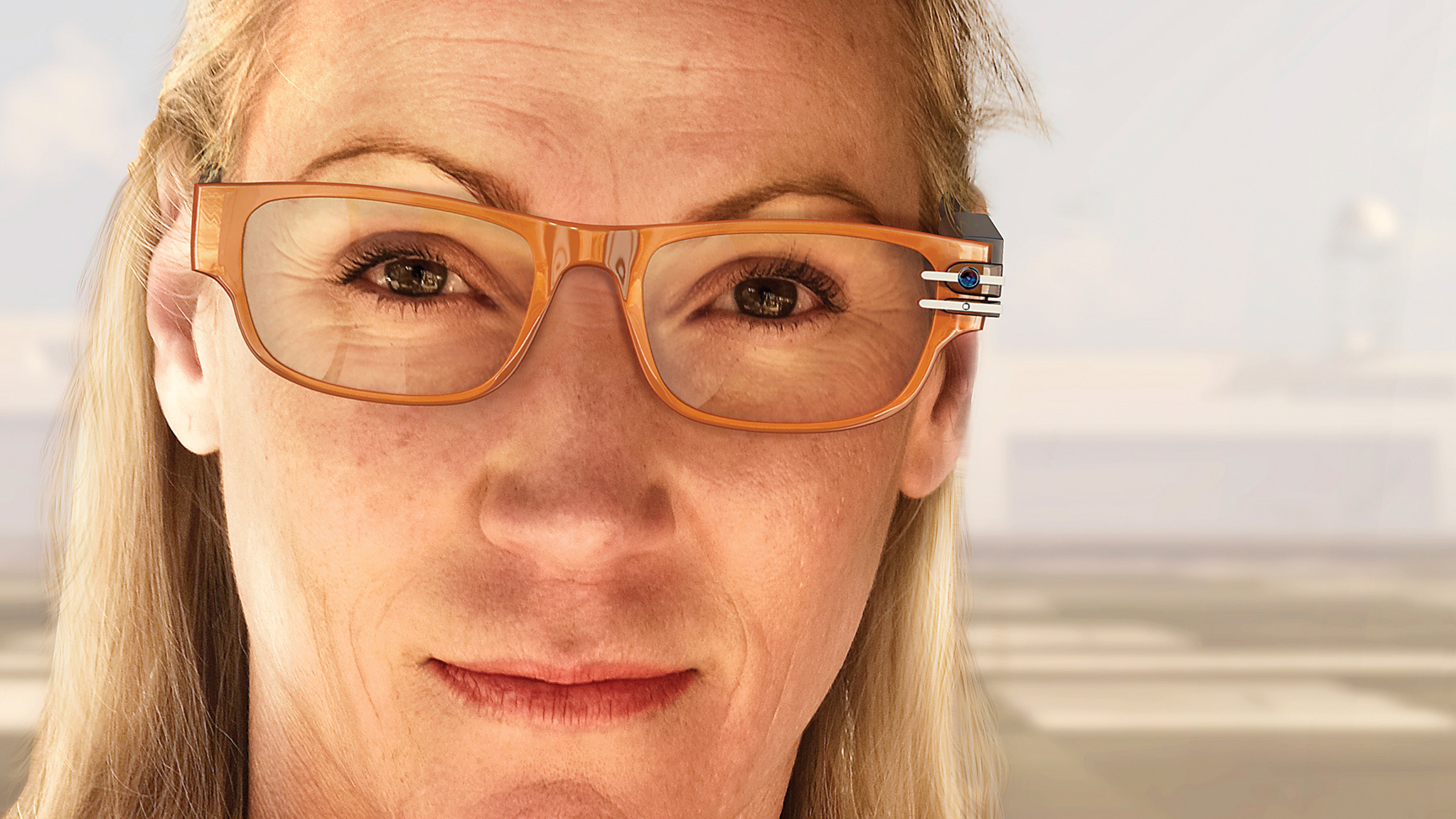 closeup of person wearing stylish glasses that include a camera