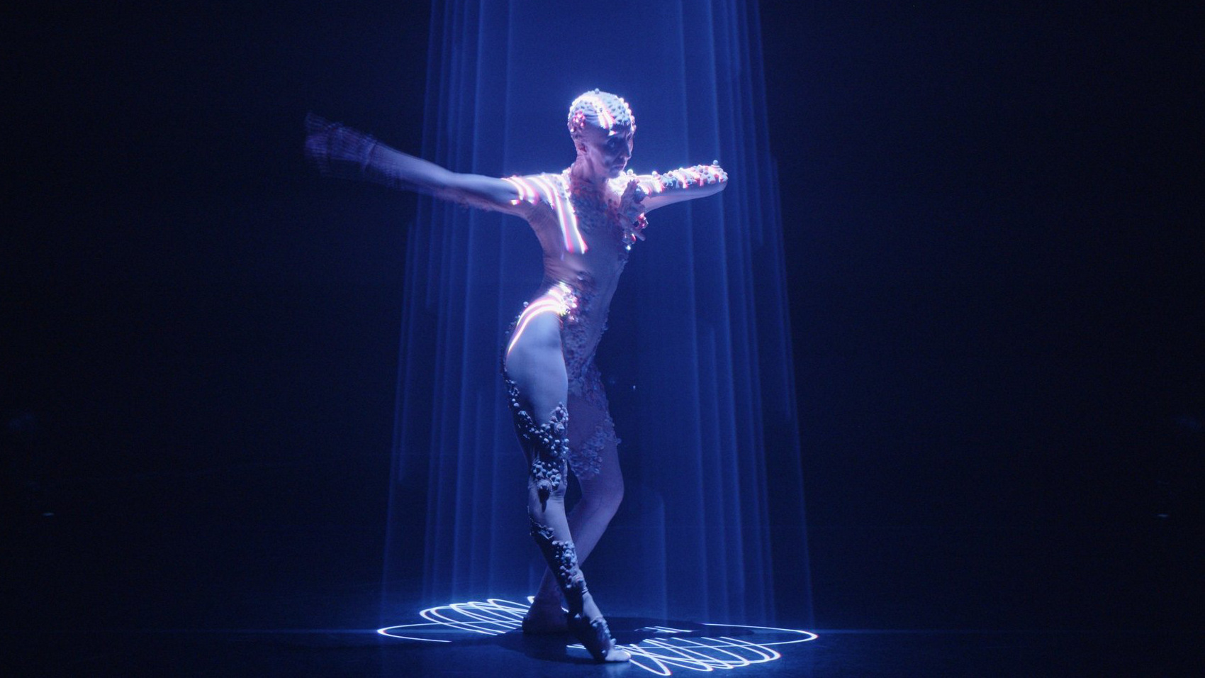 Credit: Instituto Stocos Spanish choreographer and dancer Muriel Romero wears a bodysuit containing motion sensors that interact with light beams and artificial intelligence.