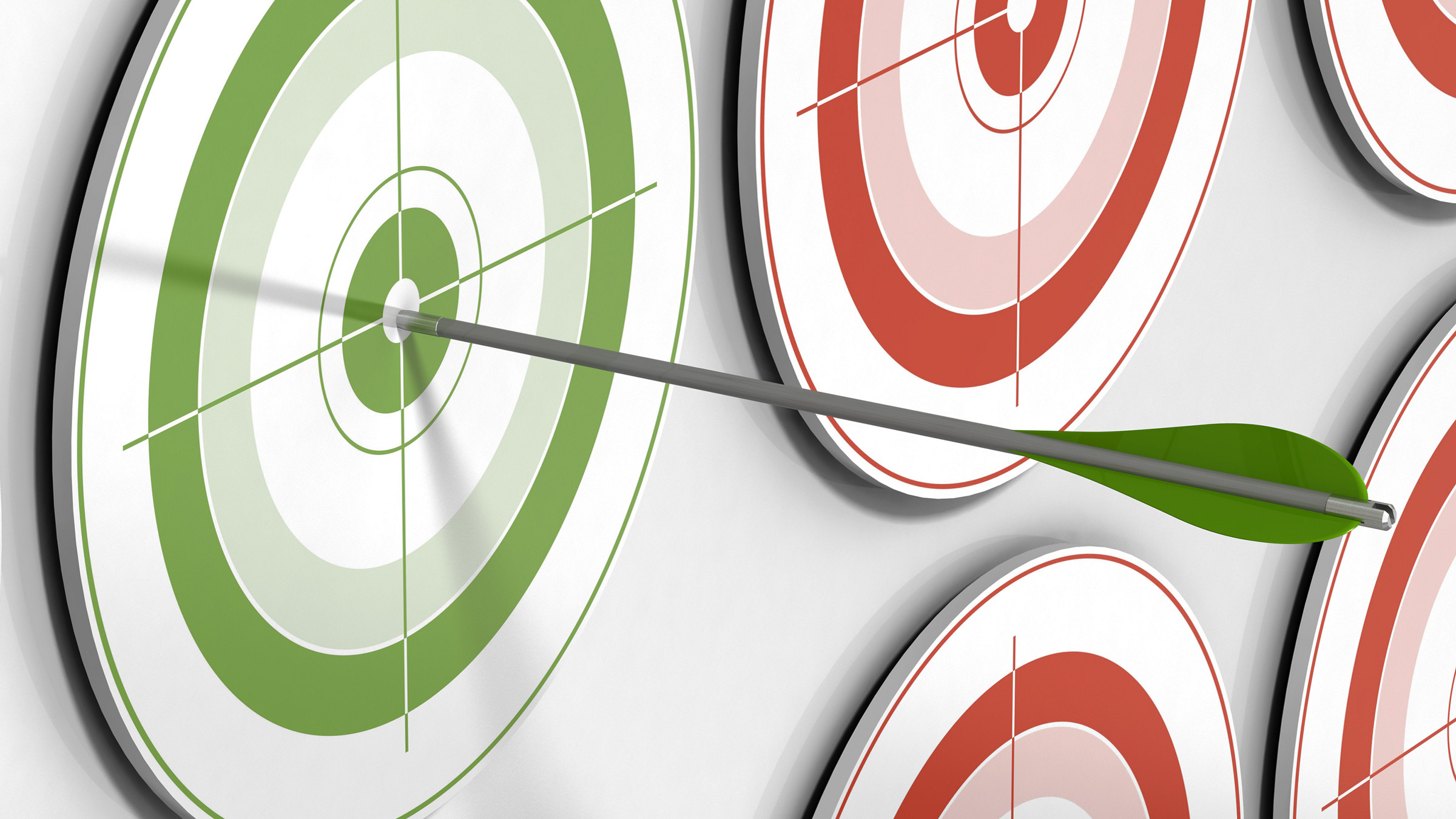 arrow in the bullseye of a green target next to a red target, illustration