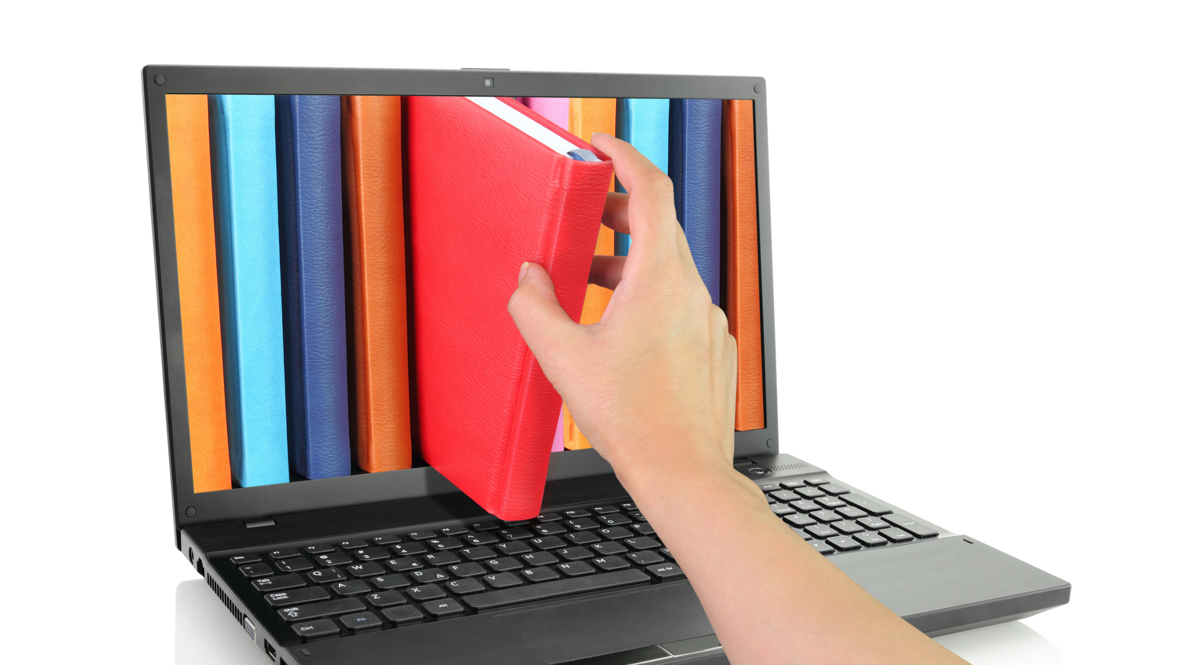 hand pulling a book from a laptop computer screen
