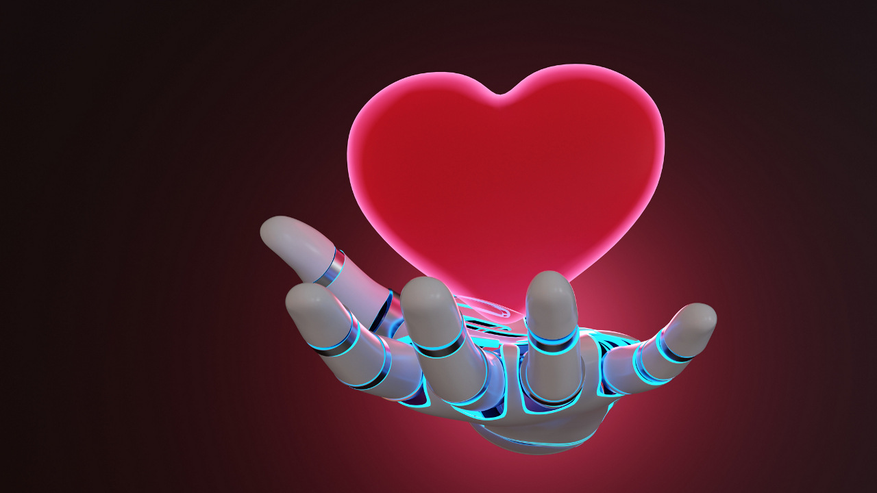 Credit: Getty Images heart held by a robotic hand, illustration