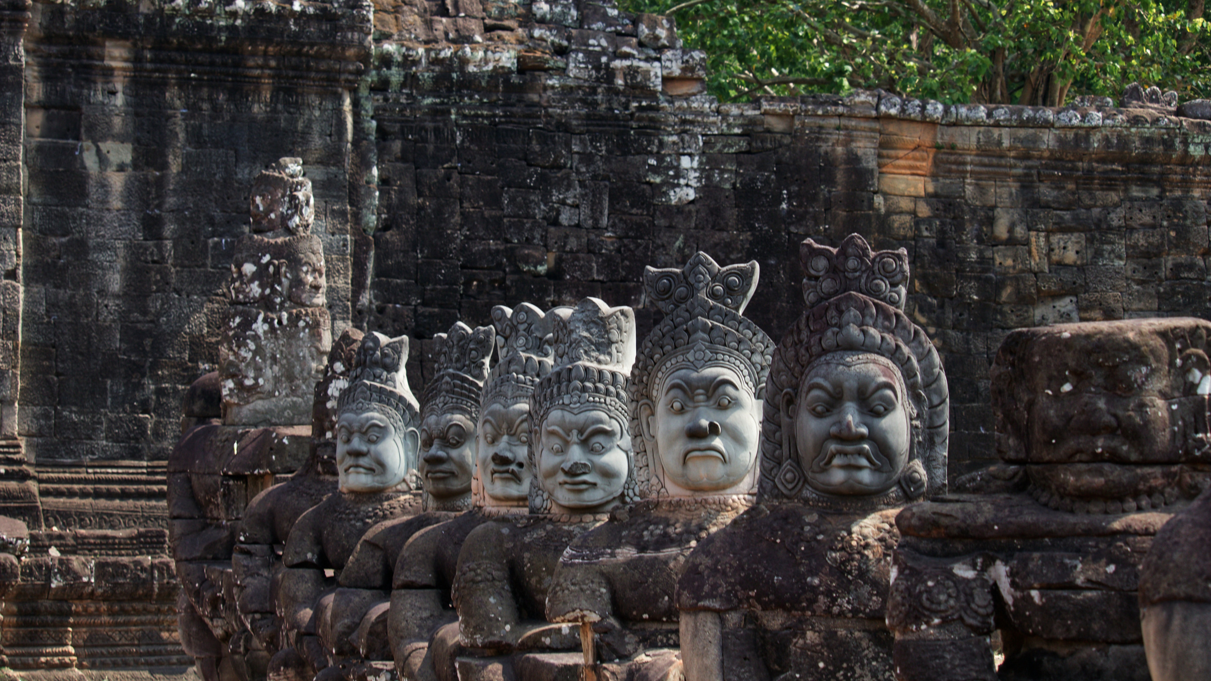 carved faces at the gate of Angkor Thom