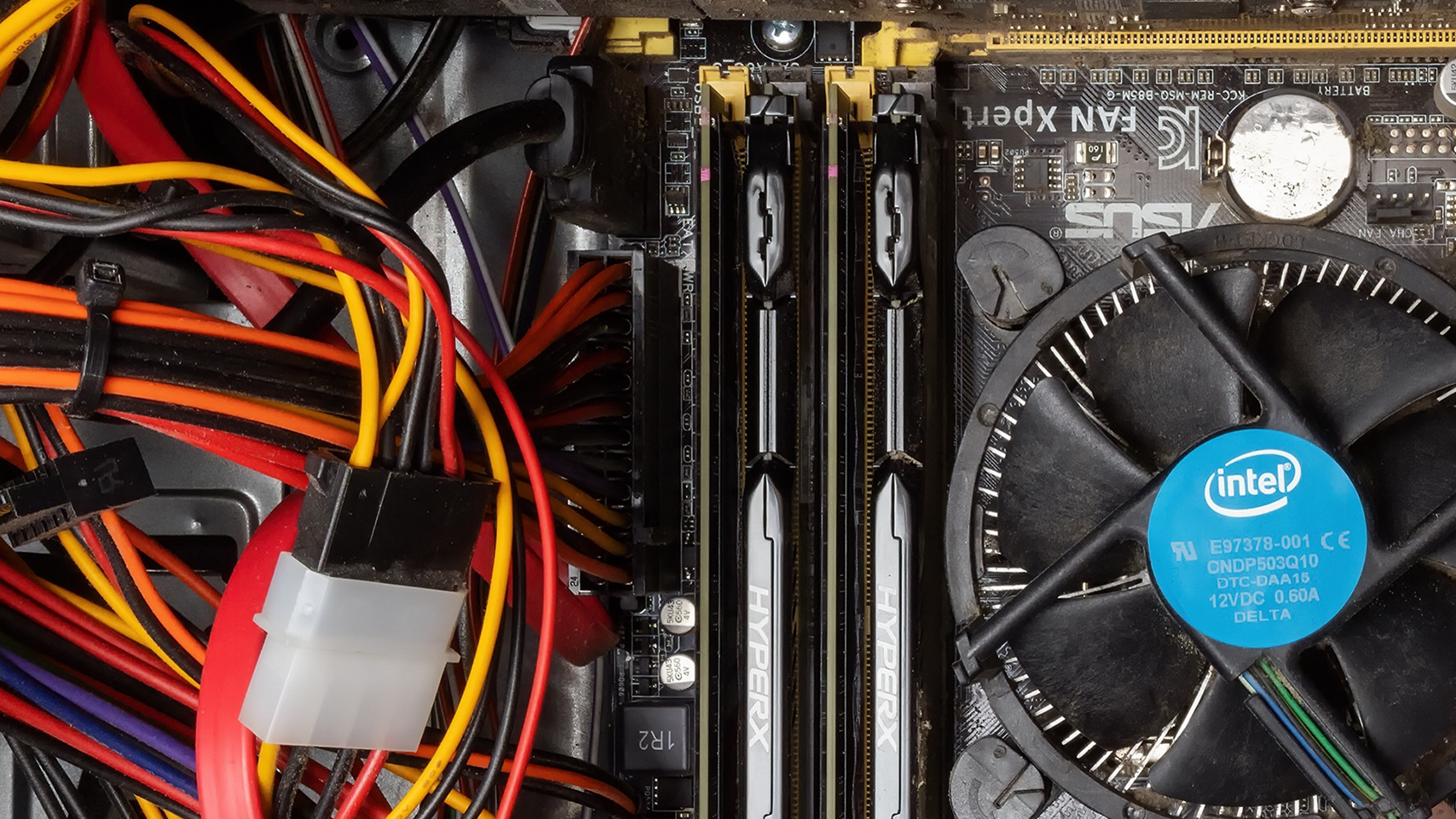 dusty interior of a computer with Intel-labeled component