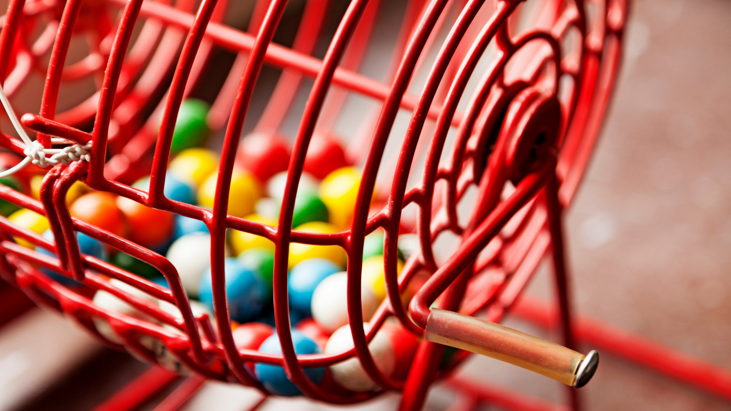 colored balls in a bingo cage