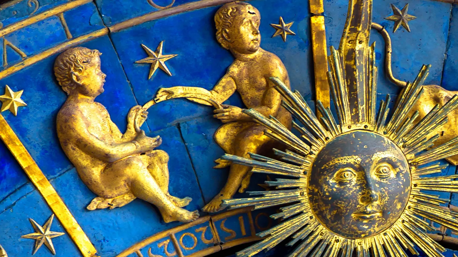 Gemini twins on zodiac wheel