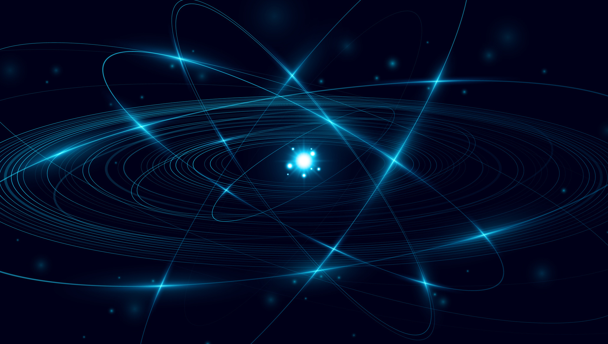glowing atom and blue elliptical rings