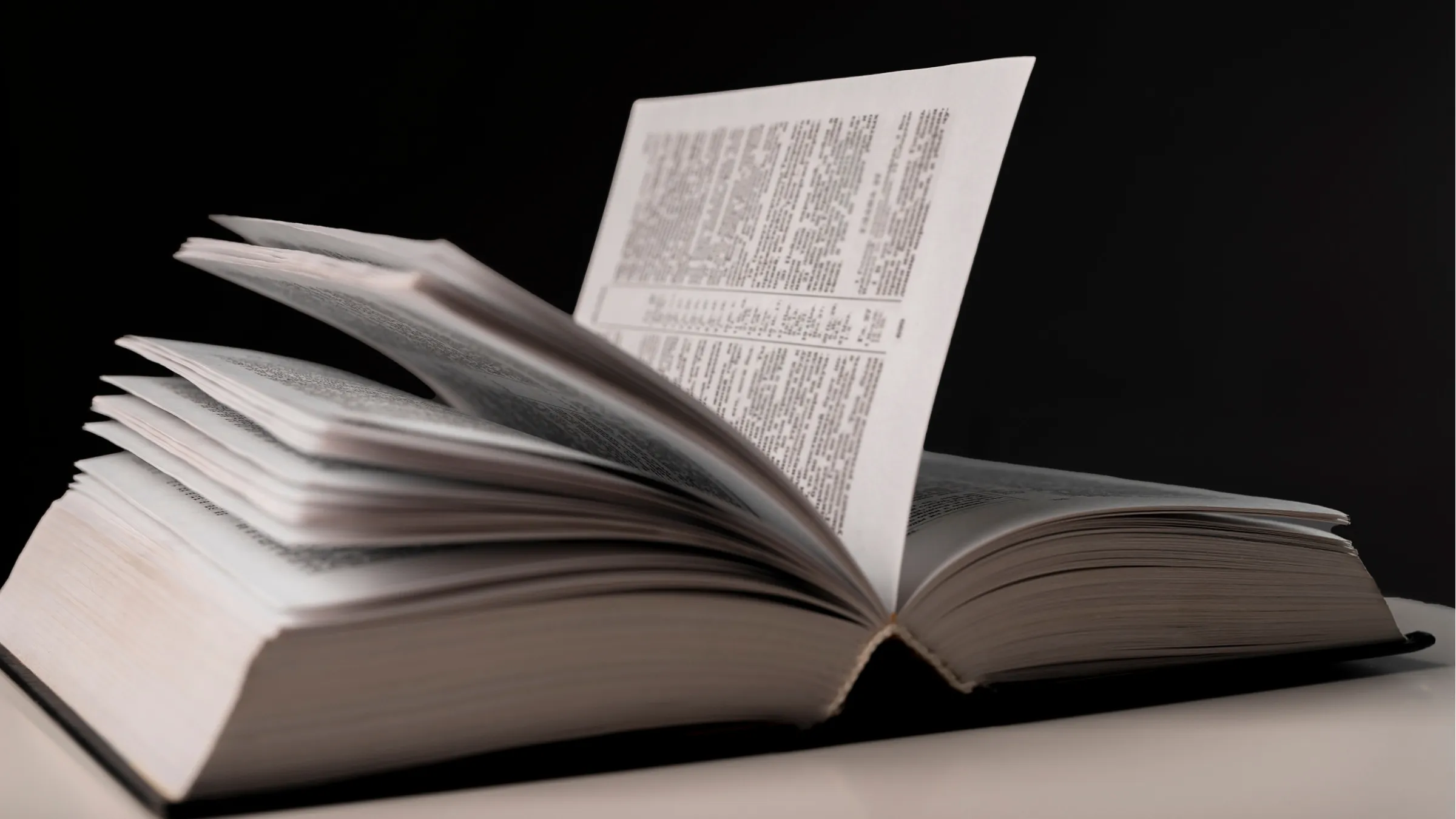 open book with turning pages